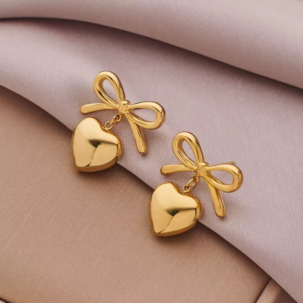 Heart bow drop earring